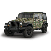 Mossy Oak Graphics 4 door Jeep Wrangler vehicle vinyl wrap in Greenleaf camo pattern