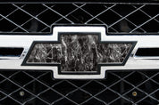 Universal auto emblem peel and stick vinyl with genuine Mossy Oak camo in Agua Blacktip pattern