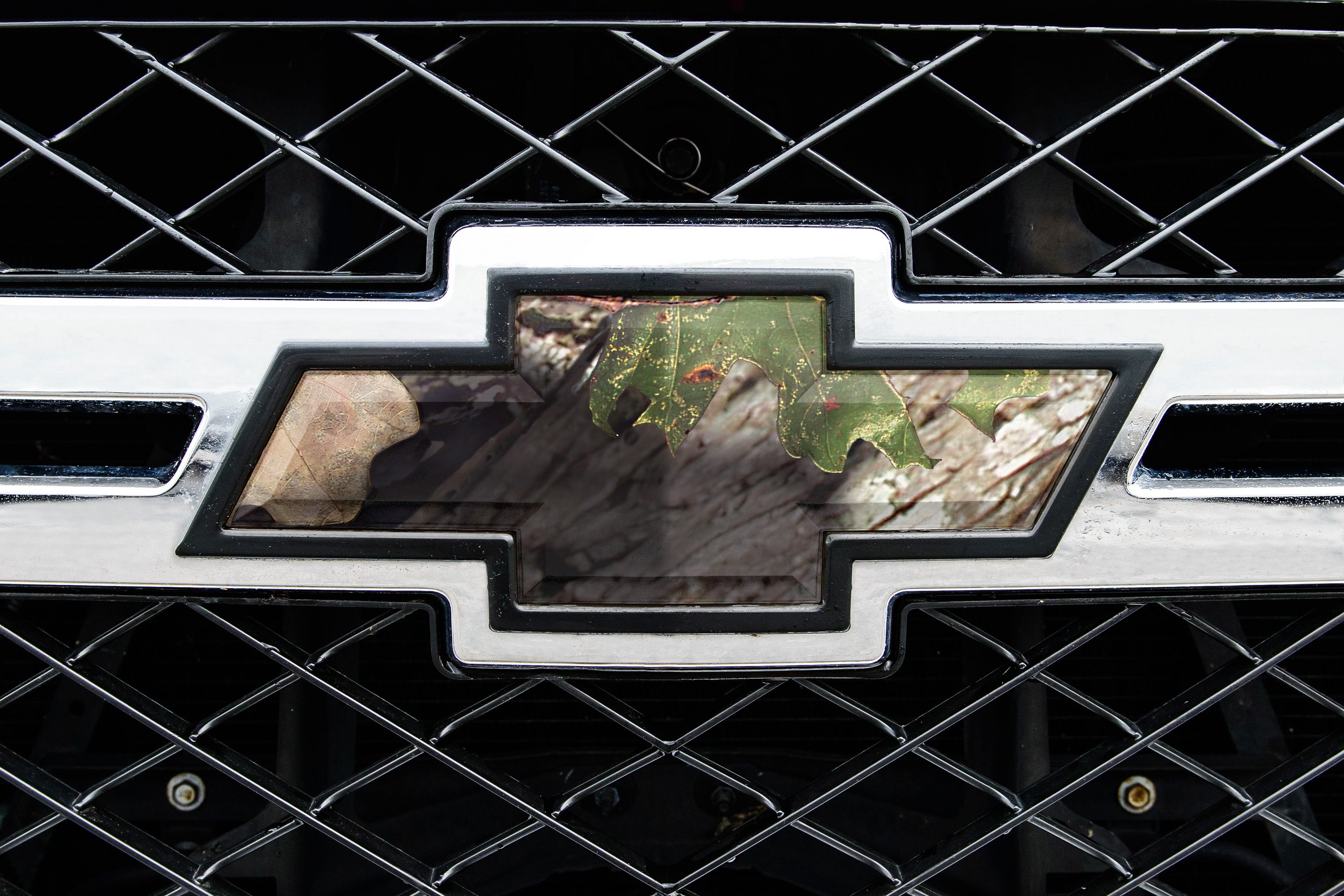 Universal auto emblem peel and stick vinyl with genuine Mossy Oak camo in Break-Up Country pattern