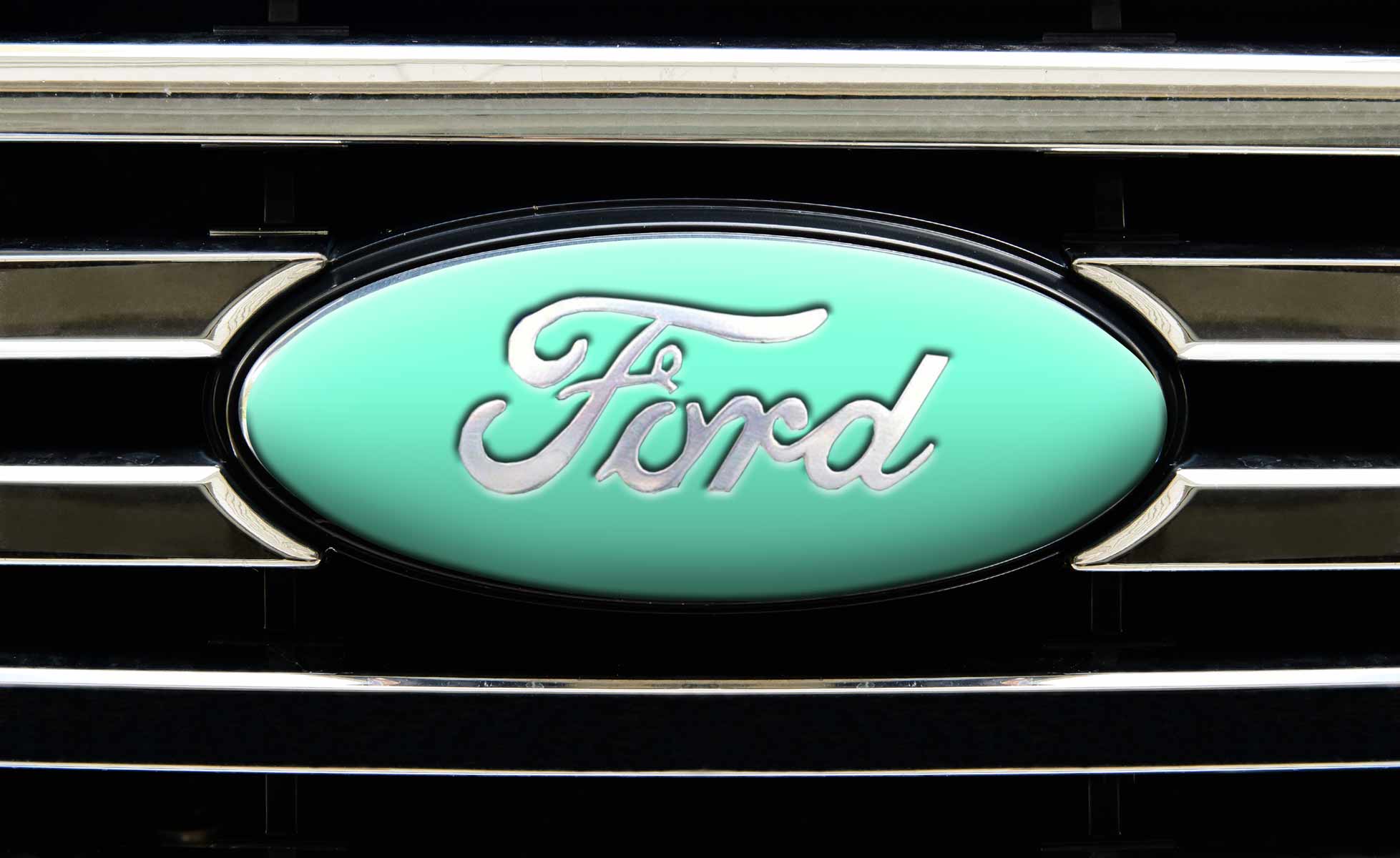 Universal auto emblem vinyl overlay in teal