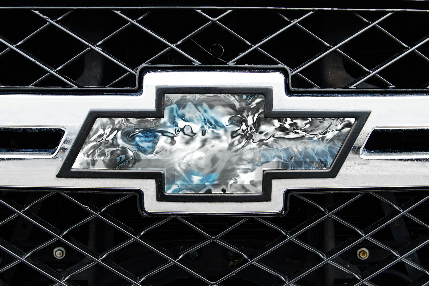 Universal auto emblem peel and stick vinyl with genuine Mossy Oak camo in Hydro Glacier pattern