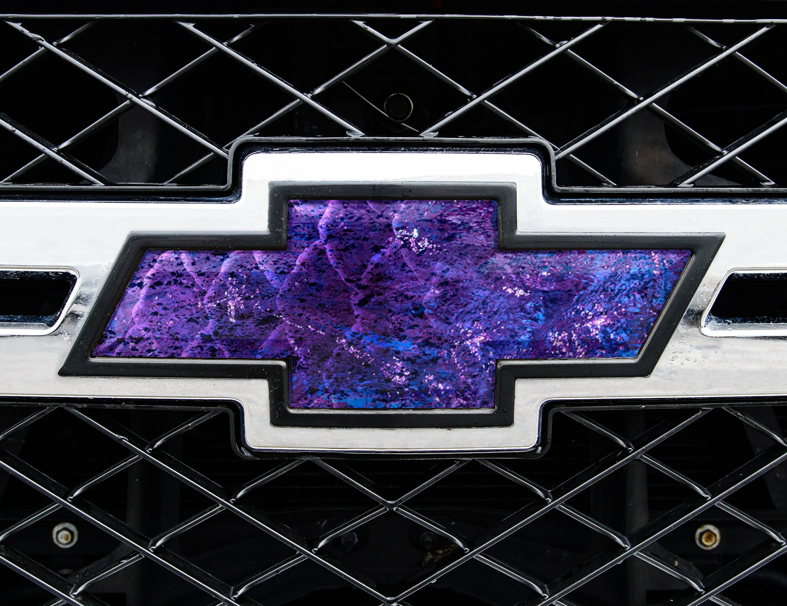 Universal auto emblem peel and stick vinyl with genuine Mossy Oak camo in Elements Indigo pattern