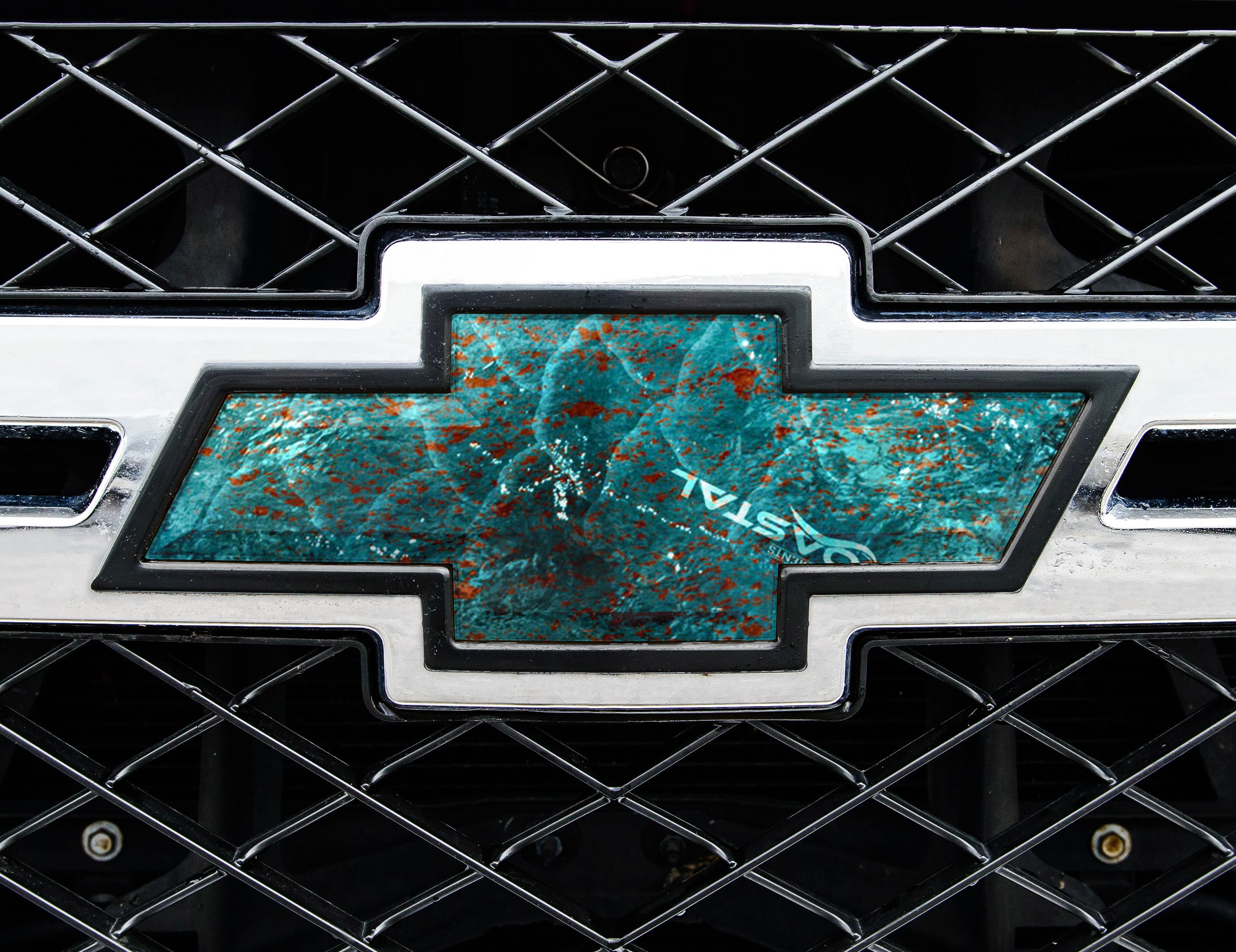 Universal auto emblem peel and stick vinyl with genuine Mossy Oak camo in Coastal King Fisher pattern