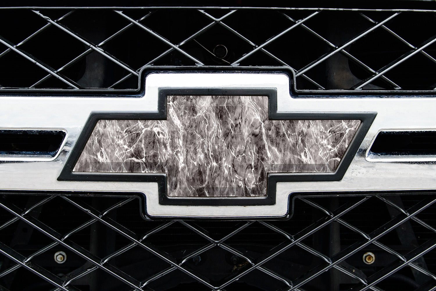 Universal auto emblem peel and stick vinyl with genuine Mossy Oak camo in Agua Manta pattern
