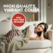 Woman lying on a couch with an America 250 Delcaration of Independence themed blanket, text about color quality and durability.