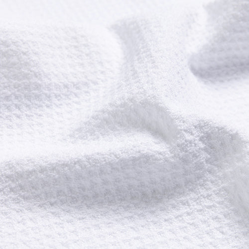 Close up detail of the waffle textured golf towel