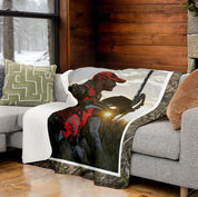 Sherpa fleece backed blanket with custom photo and Mossy Oak Graphics camo border spread on a couch
